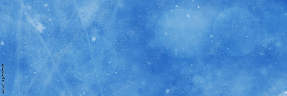 Obraz premium Frozen pattern on winter window. Blue ice winter background, texture blue wallpaper.