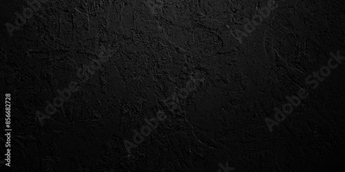 Old wall stone for dark black distressed grunge background wallpaper. rough concrete wall. Abstract black stone wall texture grunge rock surface. dark gray background backdrop. wide panoramic banner.