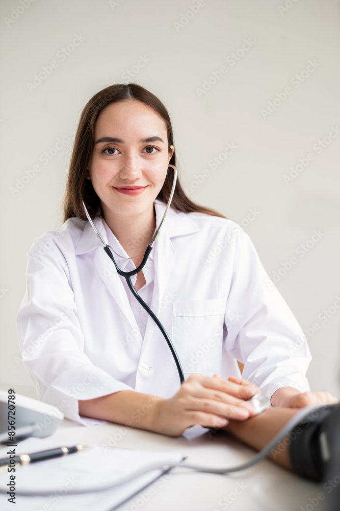 The female doctor measured blood pressure, the patient examined the heartbeat and sat down to talk about health care closely. Medical concepts and health insurance The female doctor measured blood pressure, the patient examined the heartbeat and sat down to talk about health care closely. Medical concepts and health insurance
