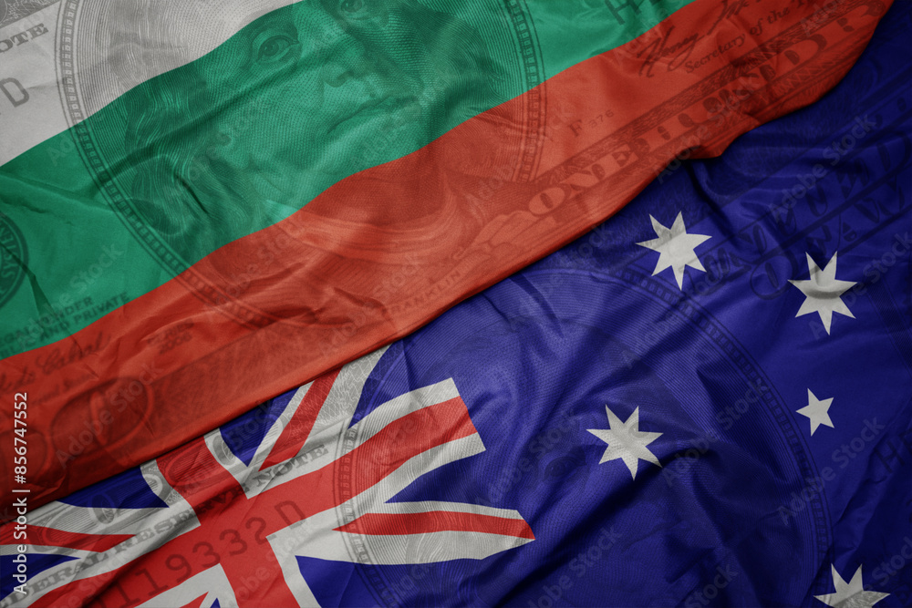 waving colorful flag of bulgaria and national flag of australia on the dollar money background. finance concept. waving colorful flag of bulgaria and national flag of australia on the dollar money background. finance concept.