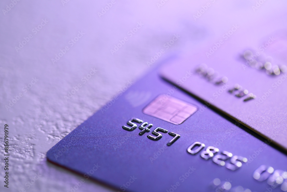 Plastic credit cards on table, closeup view. Color toned Plastic credit cards on table, closeup view. Color toned