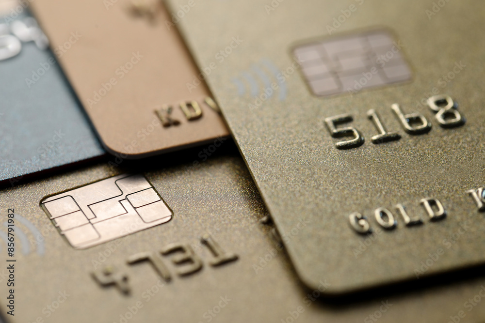 Different plastic credit cards as background, macro view Different plastic credit cards as background, macro view