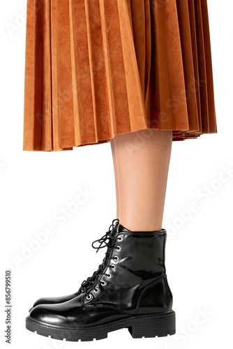 Woman in a skirt wearing combat boots