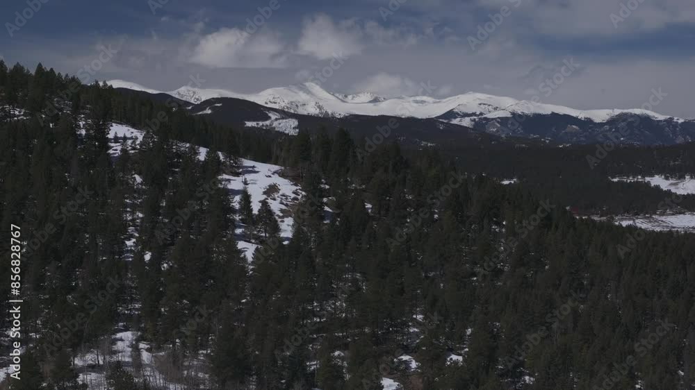 Mount Blue Sky Evans Evergreen Colorado aerial drone parallax 14er Rocky Mountain North Turkey Creek Rd Marshdale landscape spring snow melting morning sunny clouds forward pan up reveal motion Mount Blue Sky Evans Evergreen Colorado aerial drone parallax 14er Rocky Mountain North Turkey Creek Rd Marshdale landscape spring snow melting morning sunny clouds forward pan up reveal motion