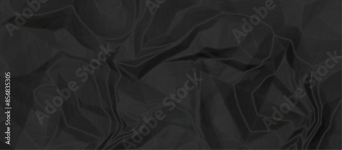 Black crumpled paper texture .