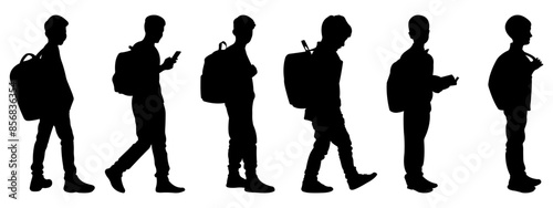 Silhouettes of schoolchildren. Set of silhouettes of boys with school bags. Vector illustration.