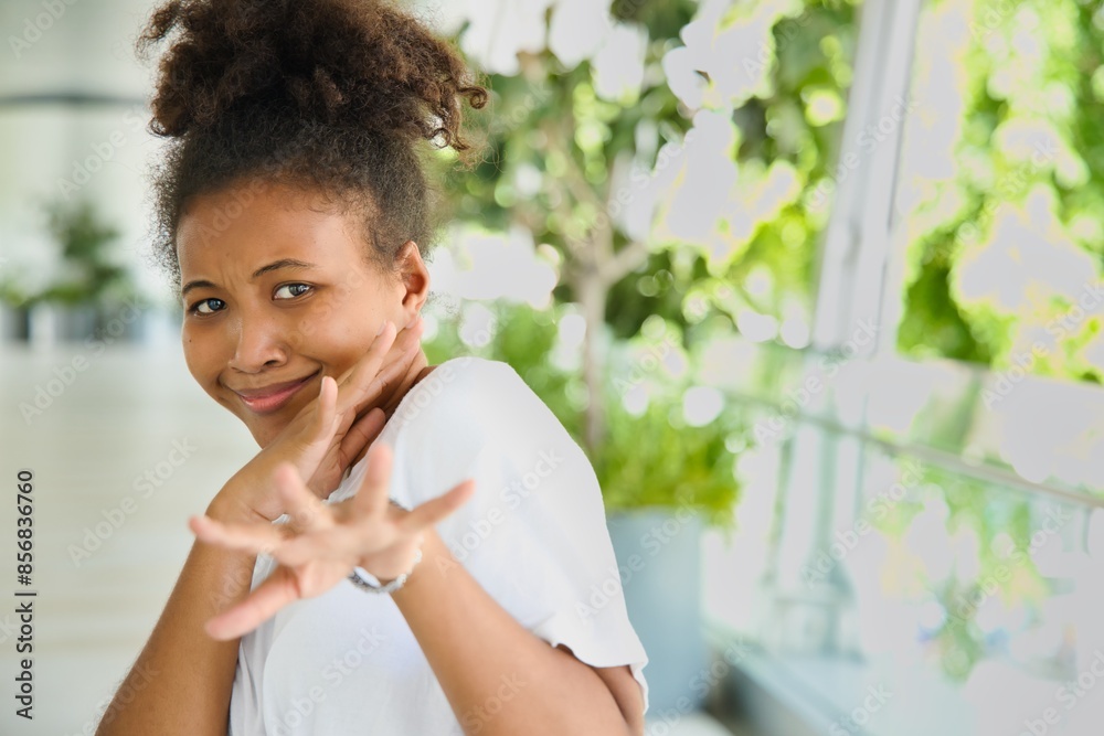 Worrying, inconfident and reluctant young African black Woman Expressing scaring off, refusal, fearful body gesture to non-verbally communicate her reluctance and problem Worrying, inconfident and reluctant young African black Woman Expressing scaring off, refusal, fearful body gesture to non-verbally communicate her reluctance and problem