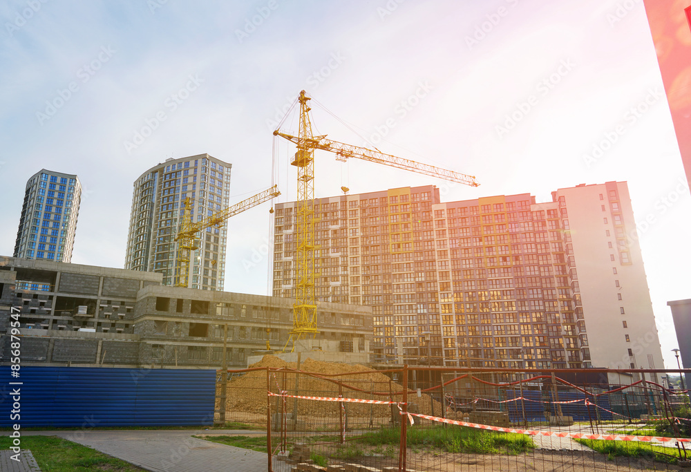Tower Crane on building construction. Construction crane on Housing. Construction site, Multi Storey Residential Buildings construction. Formworks Tower Crane on building construction. Construction crane on Housing. Construction site, Multi Storey Residential Buildings construction. Formworks