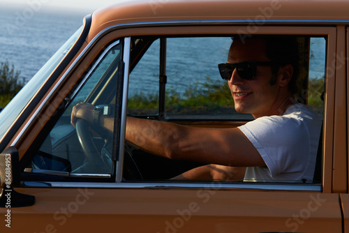 Young man driving a car