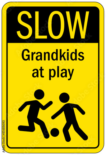Slow down, kid at play sign grandkids at play