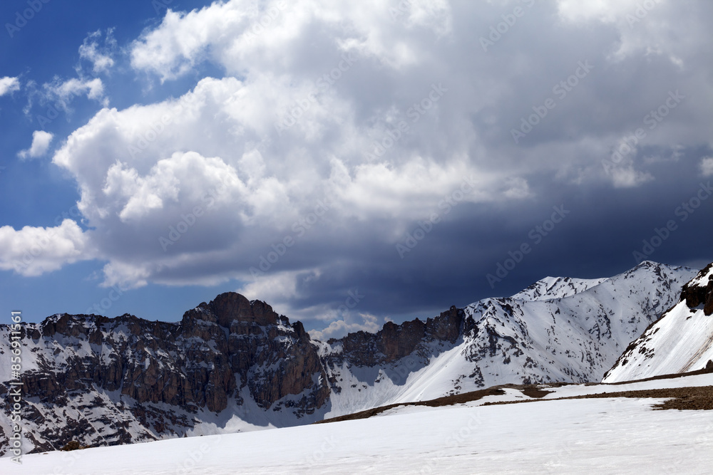 Snow mountains and sky with clouds Snow mountains and sky with clouds