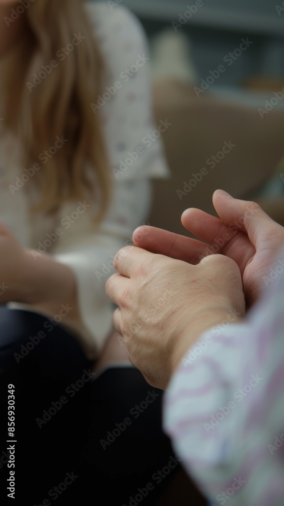 Hands of young patient while talking to therapist with stress, confusion or fear Hands of young patient while talking to therapist with stress, confusion or fear