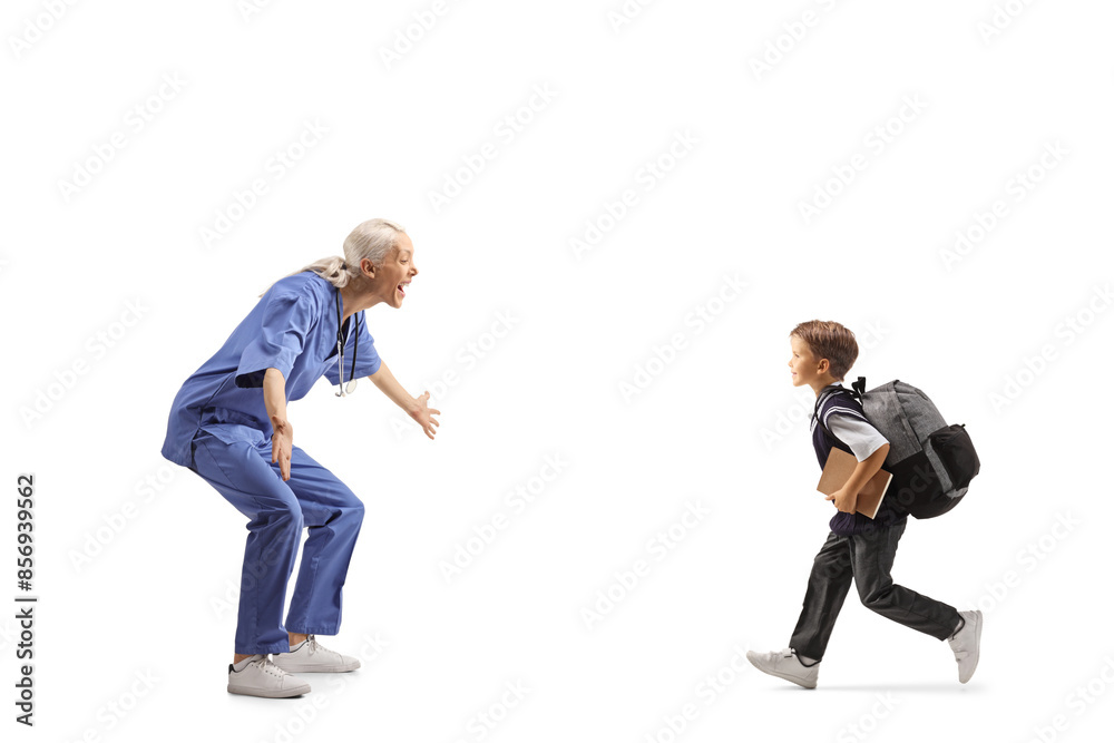 Profile shot of a happy female nurse waiting to hug a schoolboy