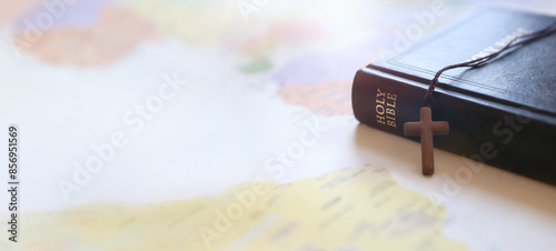 Holy cross of Jesus Christ, Bible book, world map background and mission, gospel and evangelism concept
