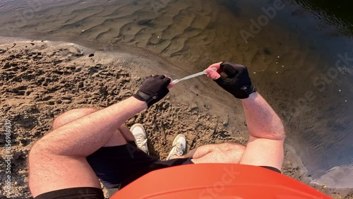 View from the perspective of collecting water samples for laboratory research. Concept of preserving water purity.