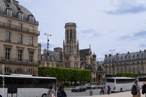 Busy street in Paris, France. Tourist destination. Public transport.