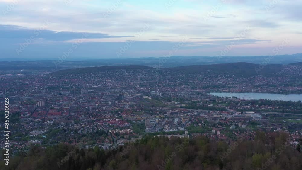 Zurich Skyline and Zurich Lake from Uetliberg Mountain on Cloudy Day. Switzerland. Aerial View. Drone Moves Sideways Zurich Skyline and Zurich Lake from Uetliberg Mountain on Cloudy Day. Switzerland. Aerial View. Drone Moves Sideways