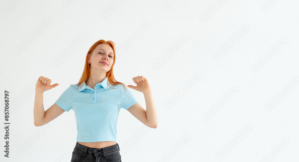 Close up photo amazing beautiful lady thumbs indicate direct chest self-confident I am best choice choose pick select me advice wear casual blue t-shirt isolated white background Close up photo amazing beautiful lady thumbs indicate direct chest self-confident I am best choice choose pick select me advice wear casual blue t-shirt isolated white background