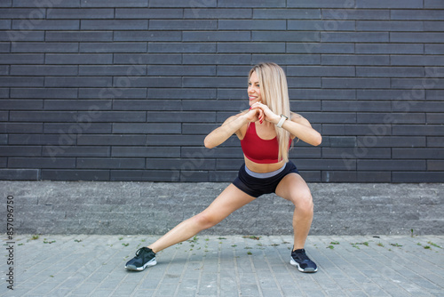 Woman Performing Outdoor Side Lunges Exercise