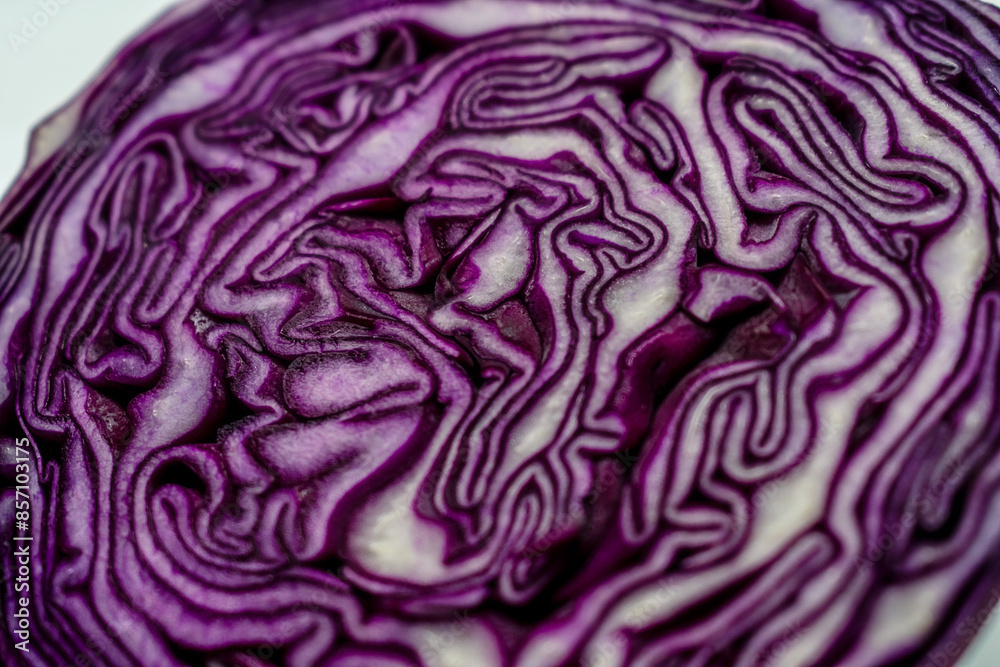Background slice of red cabbage. Cut red cabbage. Background slice of red cabbage. Cut red cabbage.