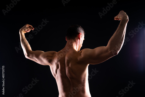 Fitness, man and back of body builder in closeup with strong muscle from training and workout.