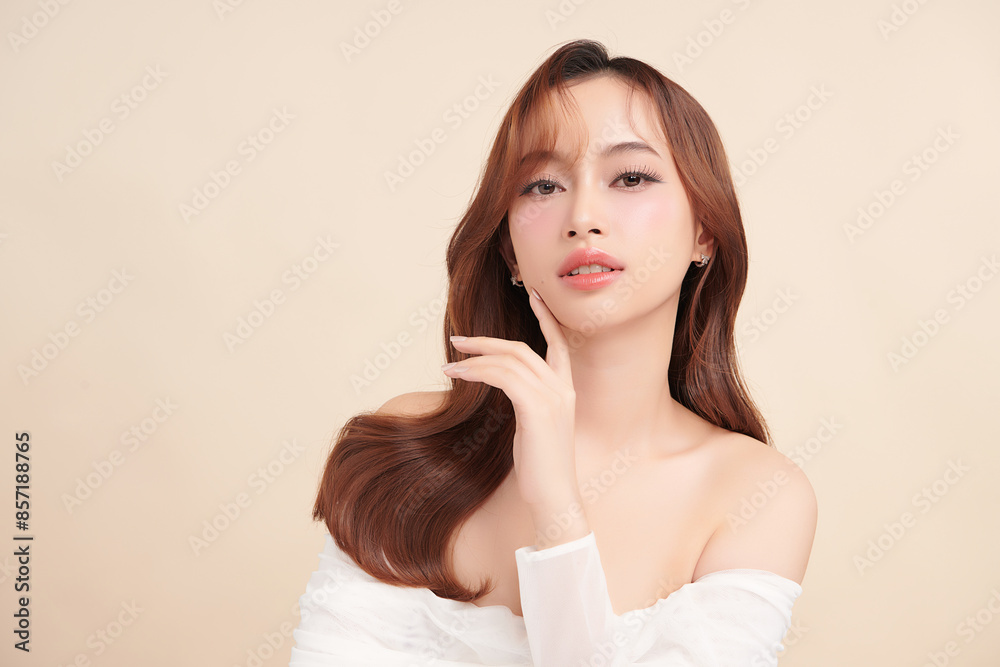 Beautiful young asian woman with clean fresh skin on beige background, Face care, Facial treatment, Cosmetology, beauty and spa, Asian women portrait. Beautiful young asian woman with clean fresh skin on beige background, Face care, Facial treatment, Cosmetology, beauty and spa, Asian women portrait.