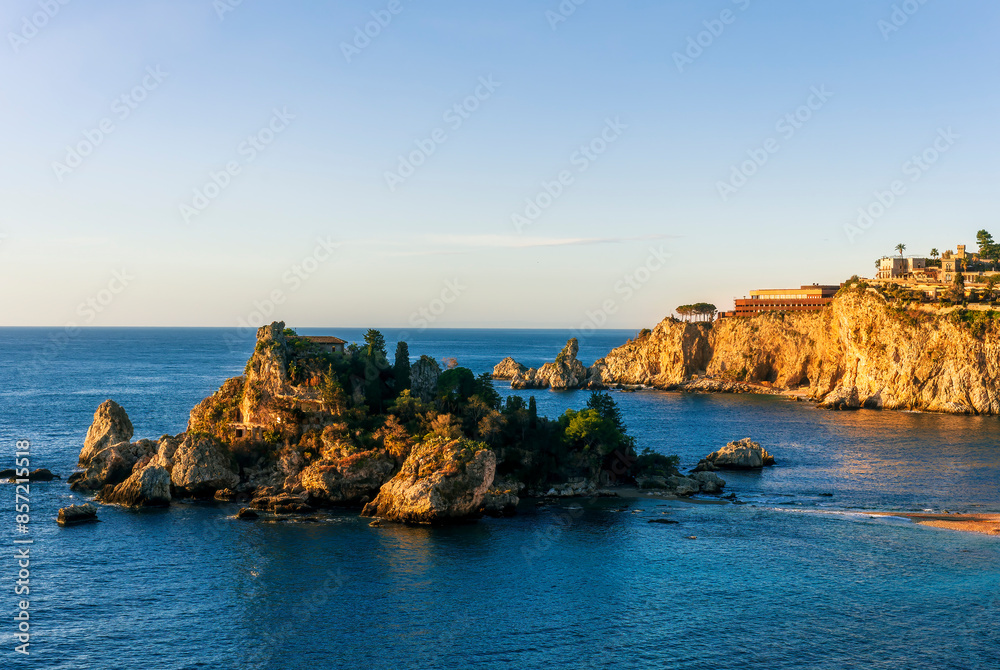 scenic sea shore view of island in ocean with waves and amazing cloudy sunset or sunrise on backgeound scenic sea shore view of island in ocean with waves and amazing cloudy sunset or sunrise on backgeound