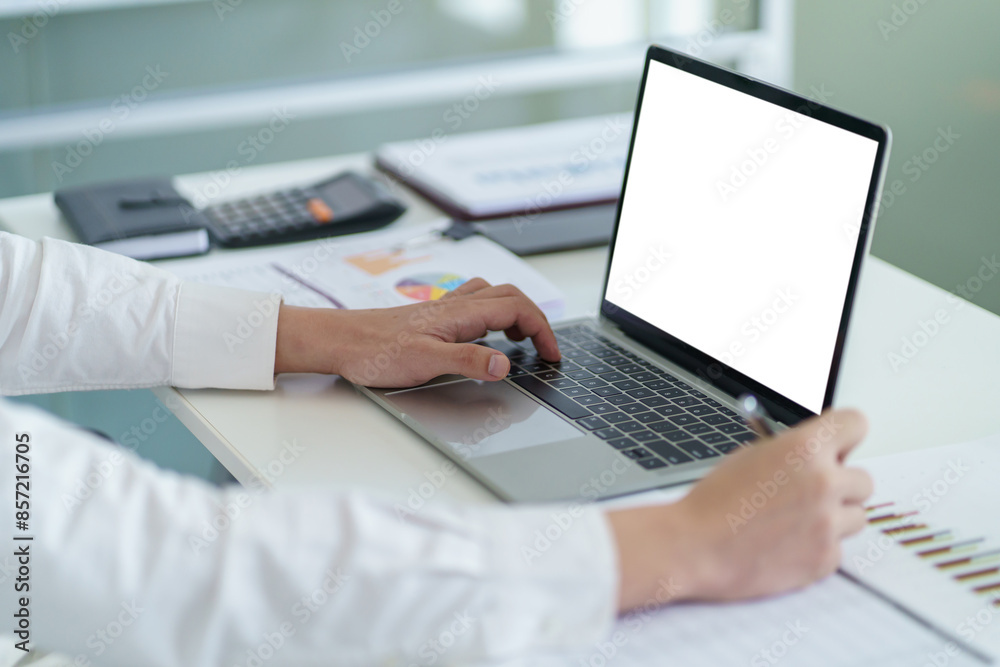 Business man working using laptop computer Hands typing keyboard. Professional investor working start up project. business planning in office. Technology business Concept Business man working using laptop computer Hands typing keyboard. Professional investor working start up project. business planning in office. Technology business Concept