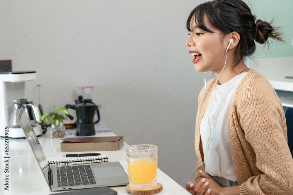 Happy young Asian Woman Successful working with laptop checking happy congrats get good news Young asian feel excited and colleague student passed exam Happy young Asian Woman Successful working with laptop checking happy congrats get good news Young asian feel excited and colleague student passed exam