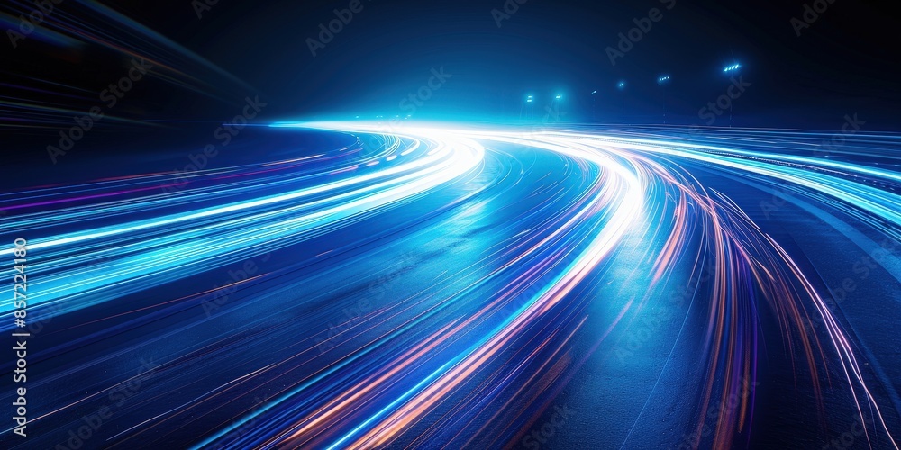 Obraz premium Abstract Light Trails of Cars on a Winding Road
