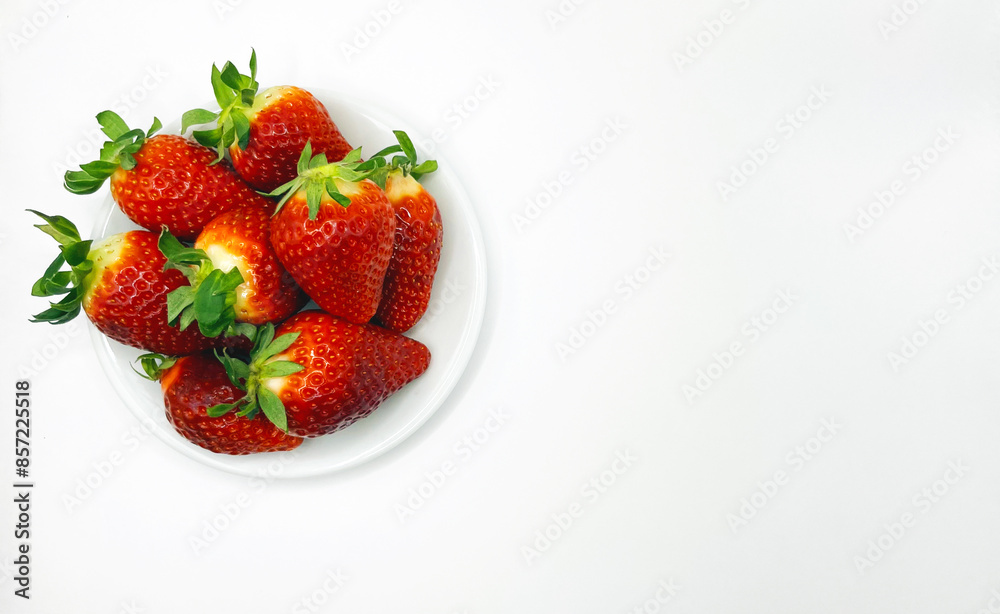 Juicy delicious strawberries in a plate. Lots of strawberries. Strawberries in a container. Red strawberries. Juicy delicious strawberries in a plate. Lots of strawberries. Strawberries in a container. Red strawberries.