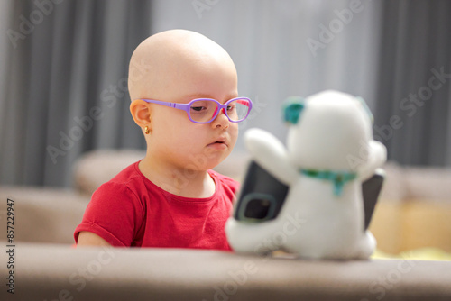 Girl with hair loss due to chemotherapy