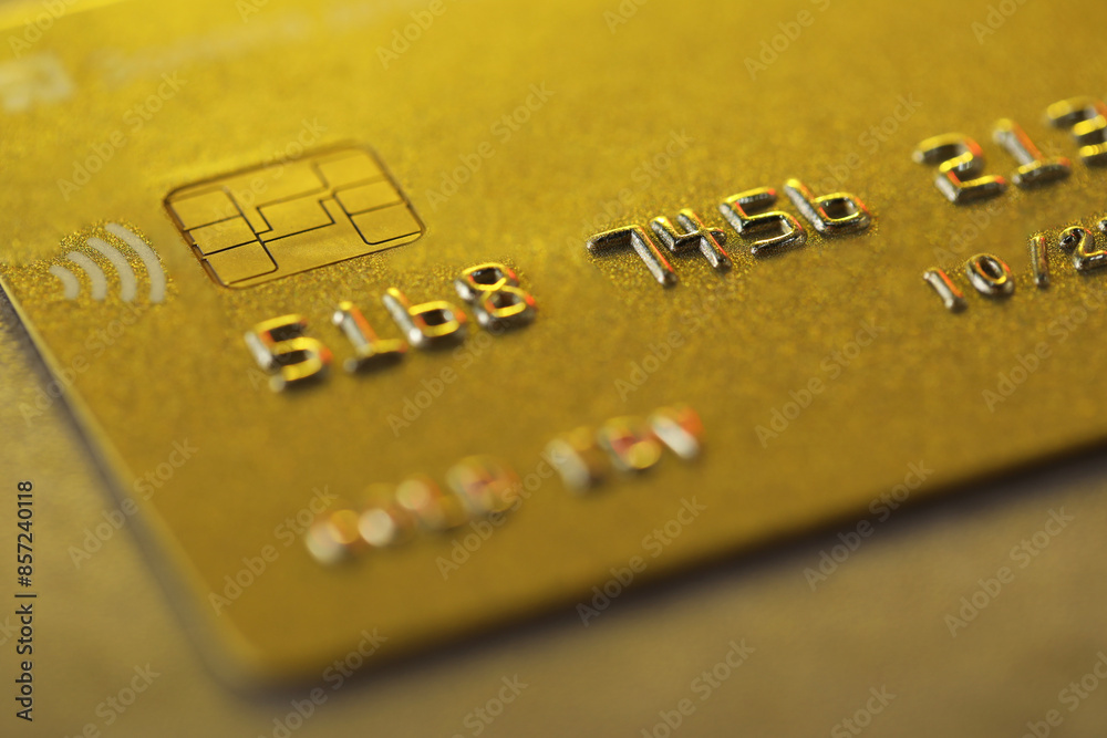 Plastic credit card on table, macro view Plastic credit card on table, macro view
