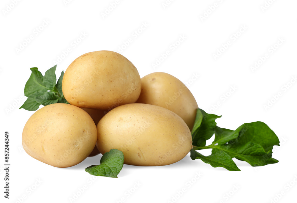Fresh raw potatoes and green leaves isolated on white Fresh raw potatoes and green leaves isolated on white