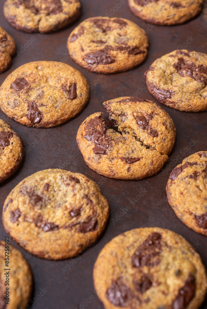 Homemade chocolate chip cookies on rustic background. Homemade chocolate chip cookies on rustic background.