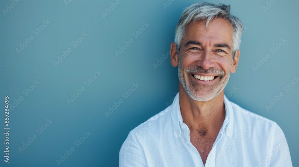 pleasant middle-aged man smiling on a neutral calm background portrait close-up pleasant middle-aged man smiling on a neutral calm background portrait close-up