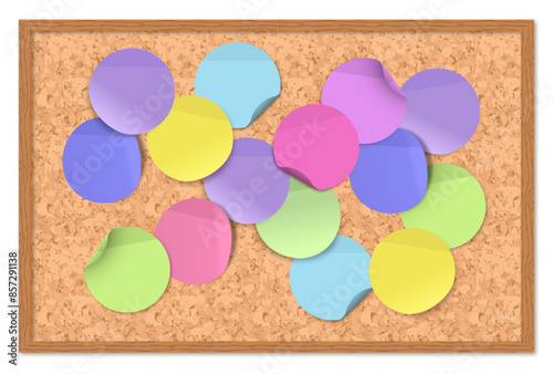 rounded colored post its in a corkboard