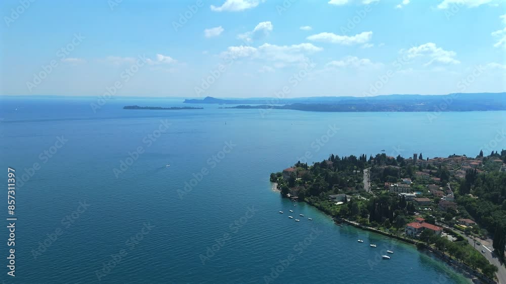 Aerial Perspectives of Lake Garda's Azure Waters and Picturesque Shoreline on a Summer Day Aerial Perspectives of Lake Garda's Azure Waters and Picturesque Shoreline on a Summer Day