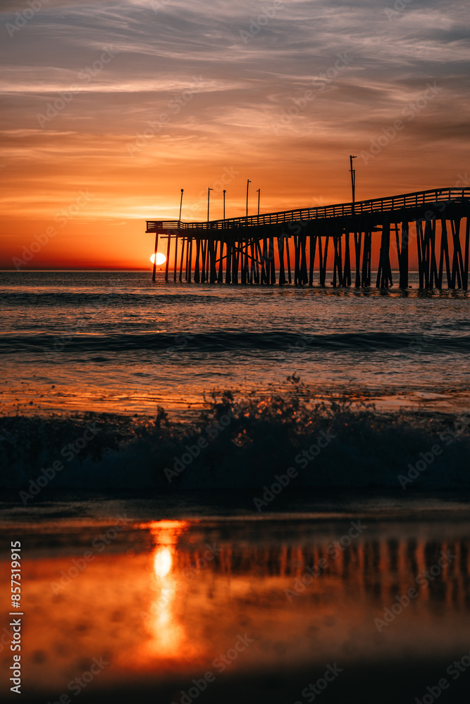 sunrise or sunset on the pier by the ocean sunrise or sunset on the pier by the ocean