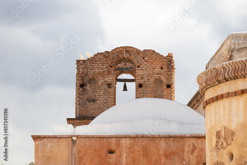 Arched belltower at Tumacacori National Historical Park, Nogalez, Arizona photo