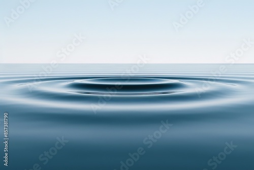 Serene water ripples creating concentric circles in a clear, calm water surface under a bright, clear sky.