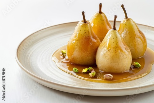 Scrumptious Caramel Pears Belle Helene with Vanilla Ice Cream and Pistachios photo