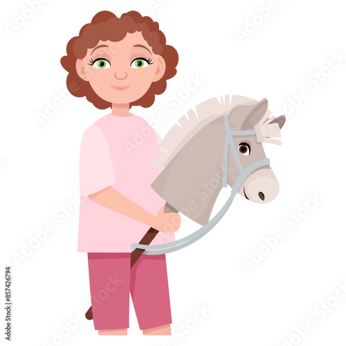 Cute young girl with toy horse head for hobbyhorsing
