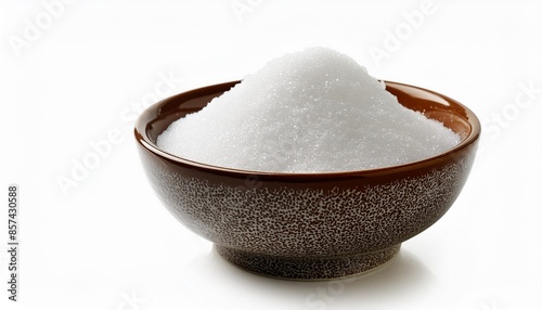 white sugar in a bowl isolated on white backgroud photo