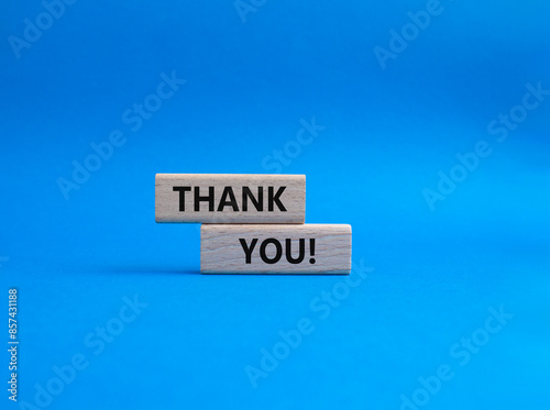 Start now symbol. Wooden blocks with words Start now. Beautiful blue background. Business and Start now concept. Copy space.
