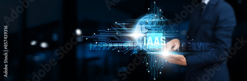 IaaS: Businessman Using Tablet on Network Structure Leveraging Cloud Technology, Infrastructure Scalability, and Virtualization on Global Business Network. Technology Concept. photo