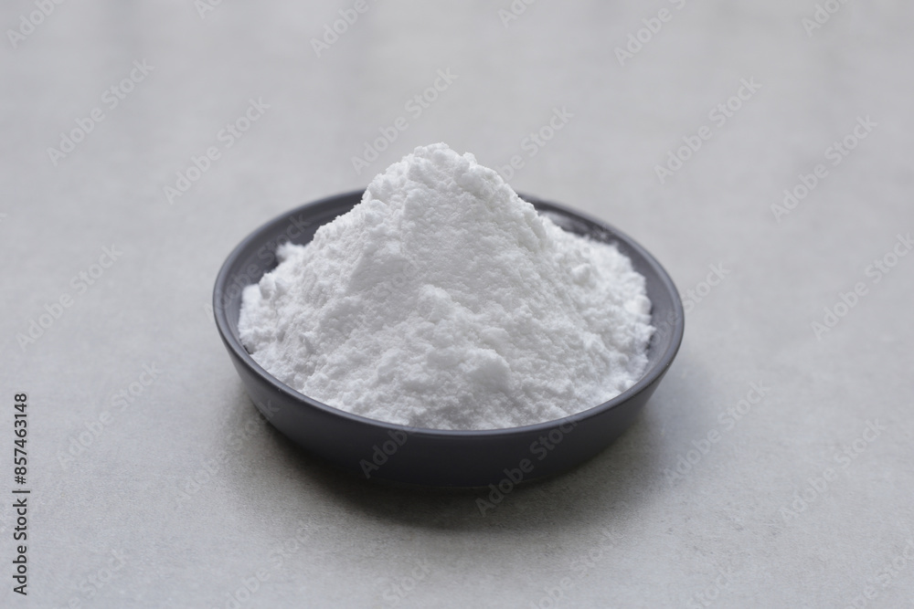 Bowl of baking soda, Sodium bicarbonate powder Bowl of baking soda, Sodium bicarbonate powder