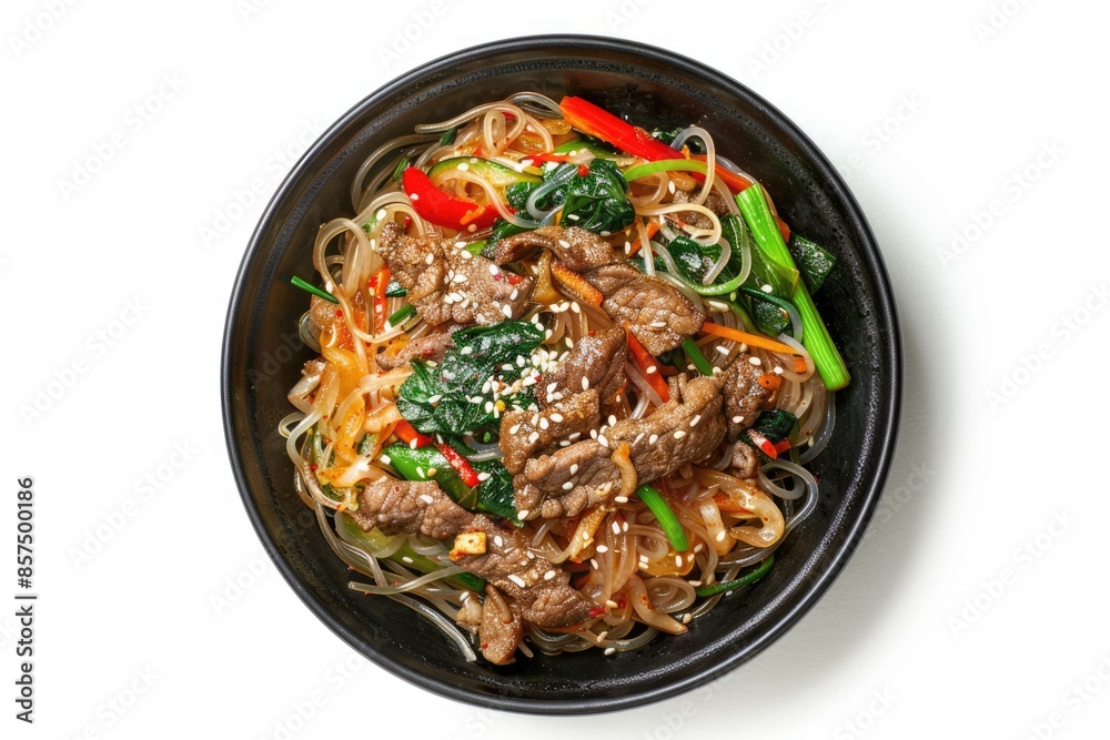 Top view of Japchae in black bowl Asian cuisine dish. Top view of Japchae in black bowl Asian cuisine dish.