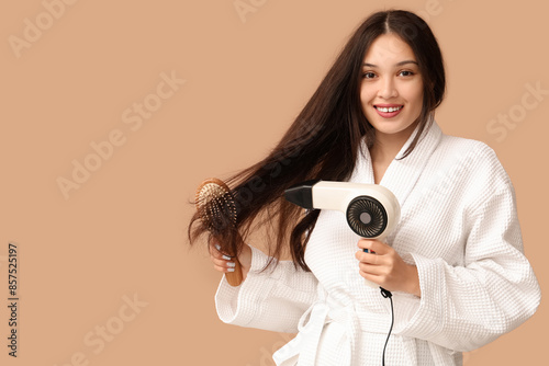 Beautiful young Asian woman...