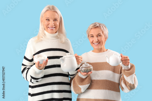 Mature women with dry tea, ...